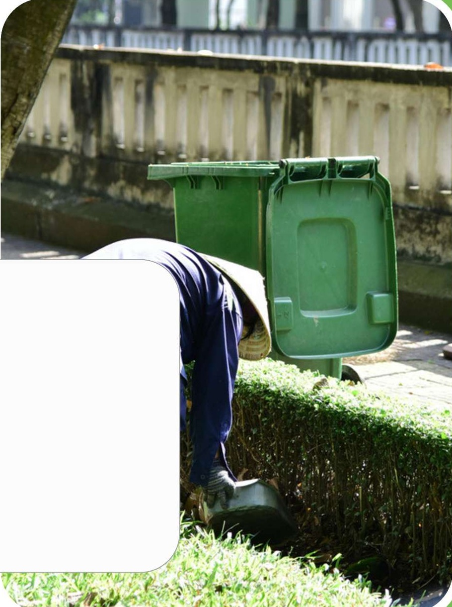 Community waste sector workers engaged in clean environmental upkeep