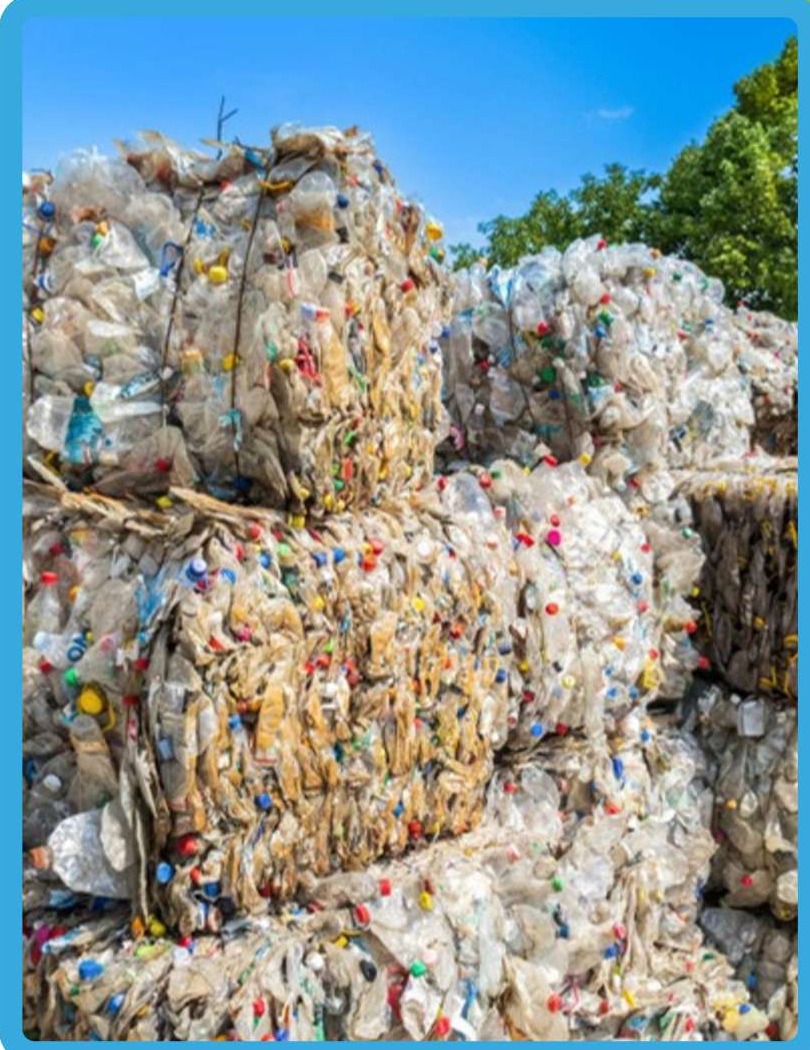 High-density compressed bales of recovered plastic bottles ready for industrial circular recycling